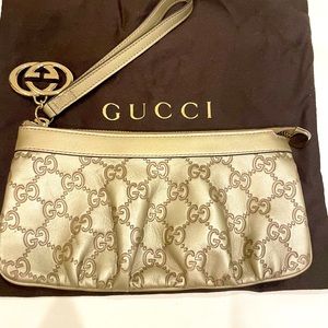 Gucci wristlet for on the go